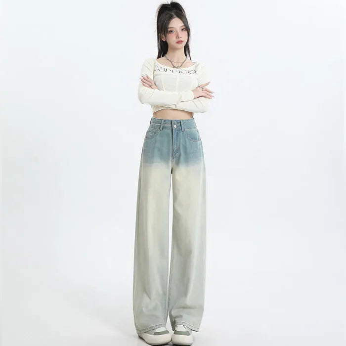 Women's gradient blue straight-leg denim trousers with wide leg design showing colour transition effect