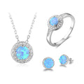 925 silver jewelry set with gem inlay including earrings, collar necklace, and ring on display