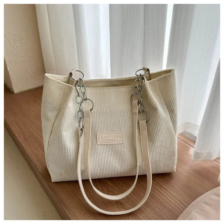 Corduroy tote bag with three-dimensional pockets in black colour option