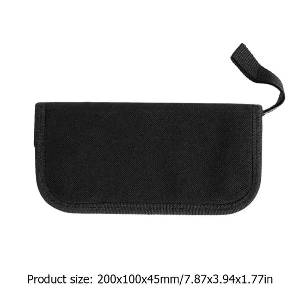Black plastic and metal guitar repair tool kit for guitars, basses, mandolins, and banjos.