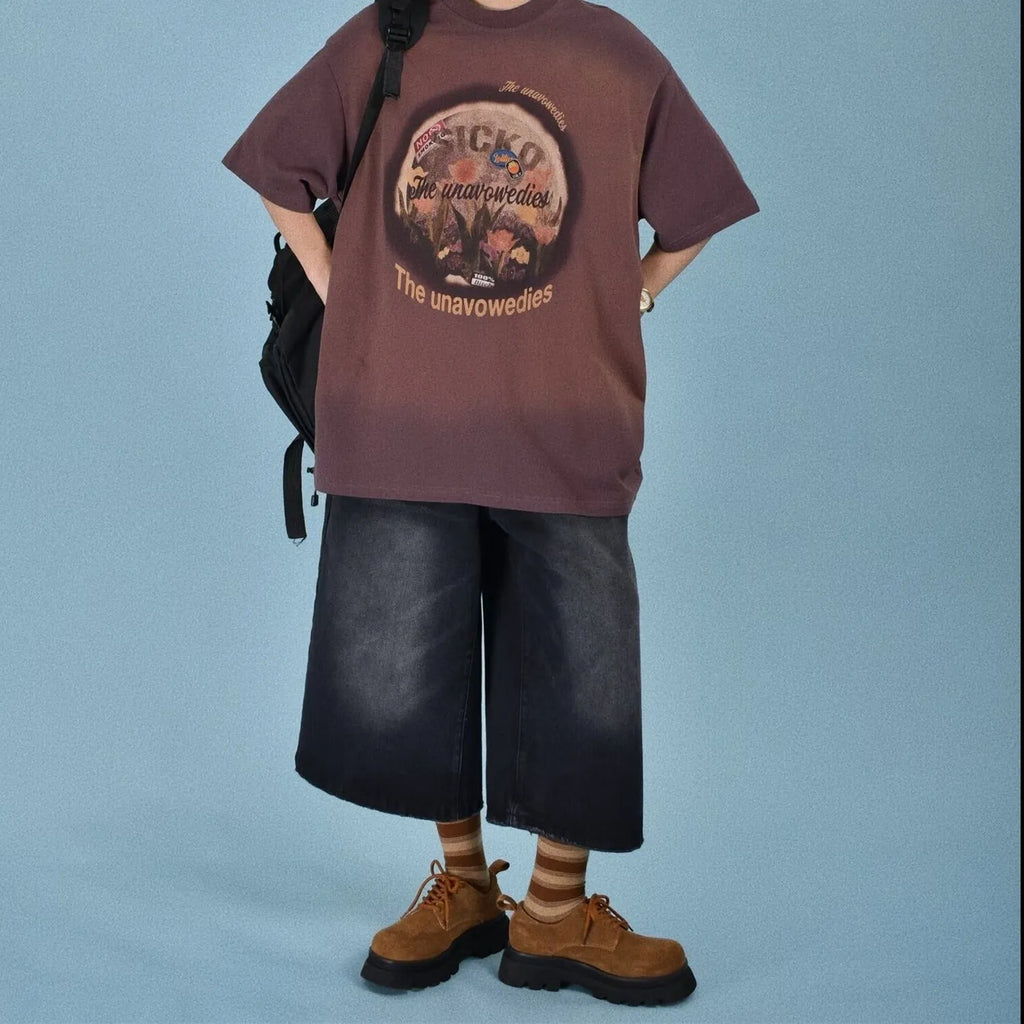 Man wearing loose straight-cut blue jeans shorts made from Trueran denim fabric.