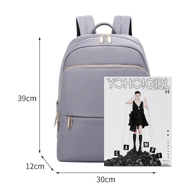 Oxford cloth women's backpack in black or purplish grey with large capacity and anti-theft features
