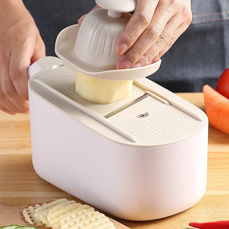Blue multifunctional vegetable cutter with stainless steel blades in Nordic style design