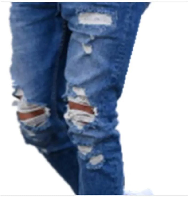 Men's blue jeans with distressed hole detailing on cotton fabric