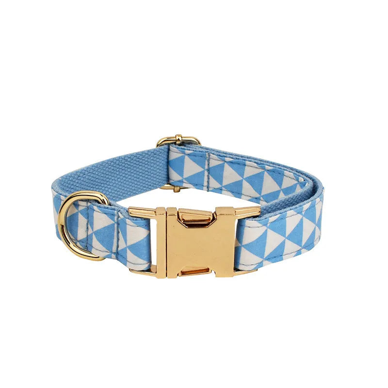 Blue cloth dog collar, leash, vest, and bow four-piece pet accessory set