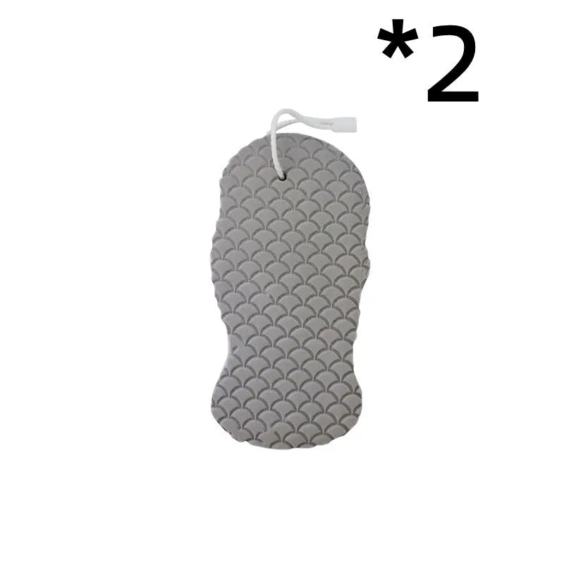 3D fish scale pattern bath sponge ball in assorted colours on a bathroom background.