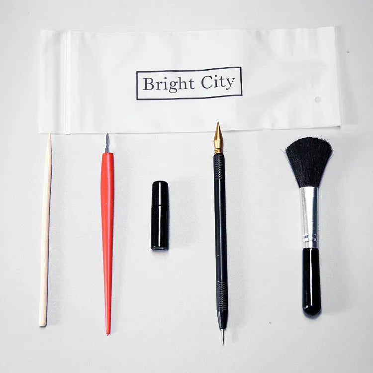 Scratch art repair tool set with scraper pen, brush, repair solution bottle, and bamboo stick.