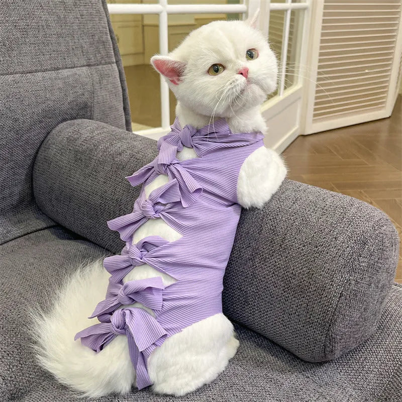 Adjustable lace-up cat sterilisation recovery clothing in polyester fabric showing size and colour options