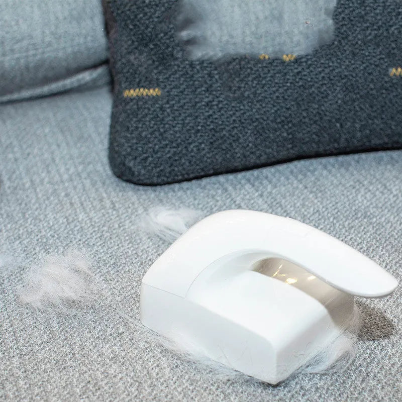 White ABS sticky hair remover roller for picking up cat hair from fabric