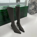 Women's black pointed toe ankle boots with stiletto heel and back zip fastener