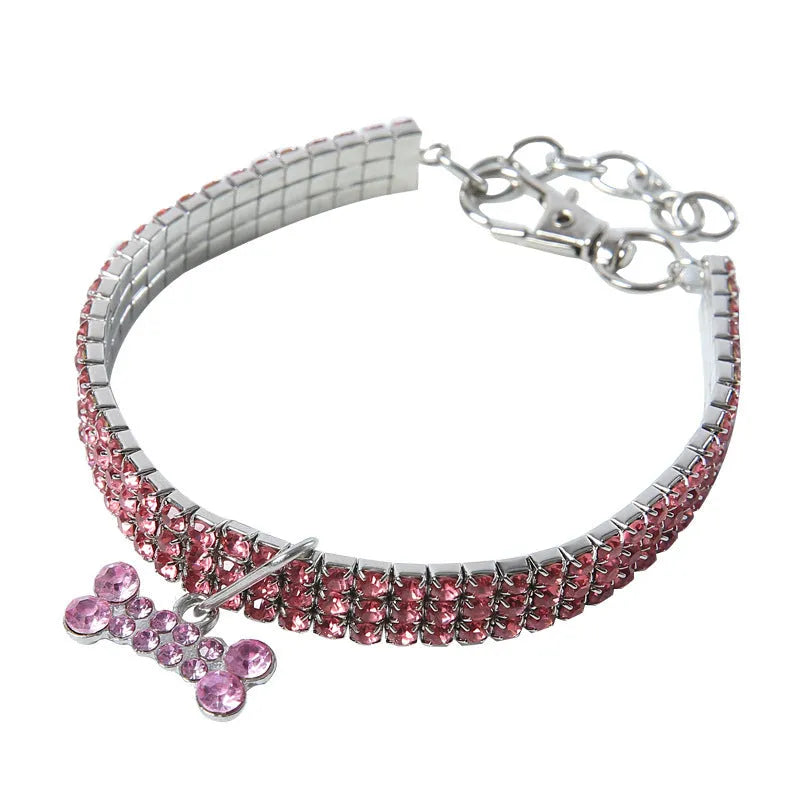 Bling rhinestone dog collar in pink with metal crystal pendant on a Chihuahua