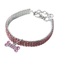 Bling rhinestone dog collar in pink with metal crystal pendant on a Chihuahua
