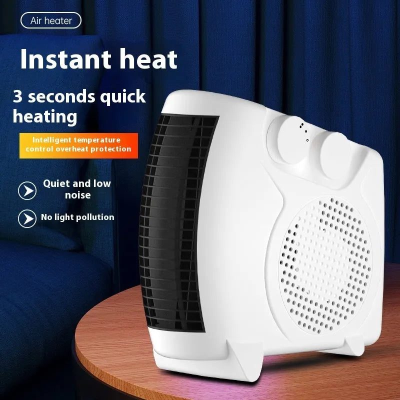 Small white desktop electric heater with control dial on a wooden desk.
