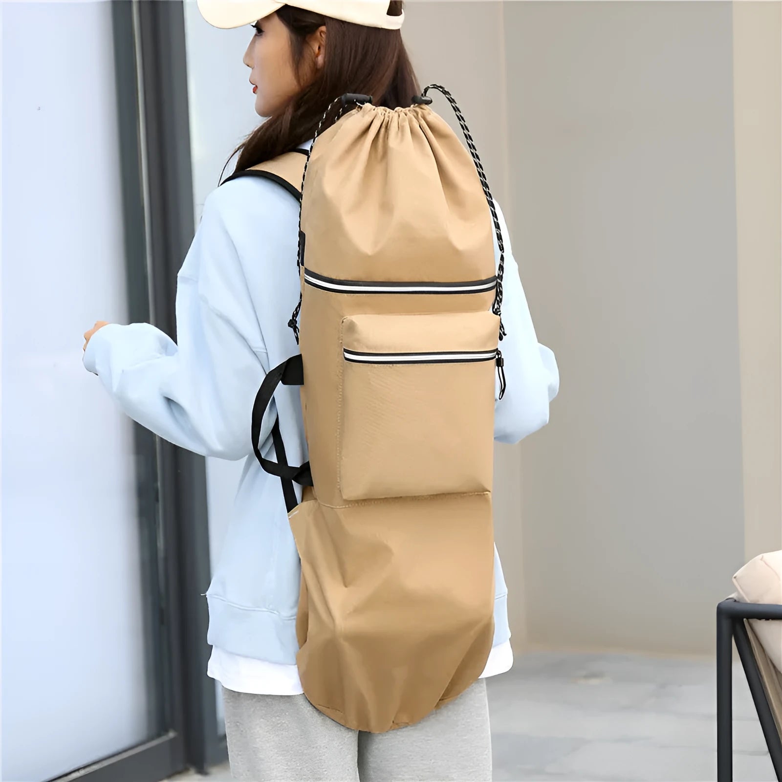 Waterproof nylon skateboard backpack in camouflage colour with 20-35 litre capacity for outdoor sports.
