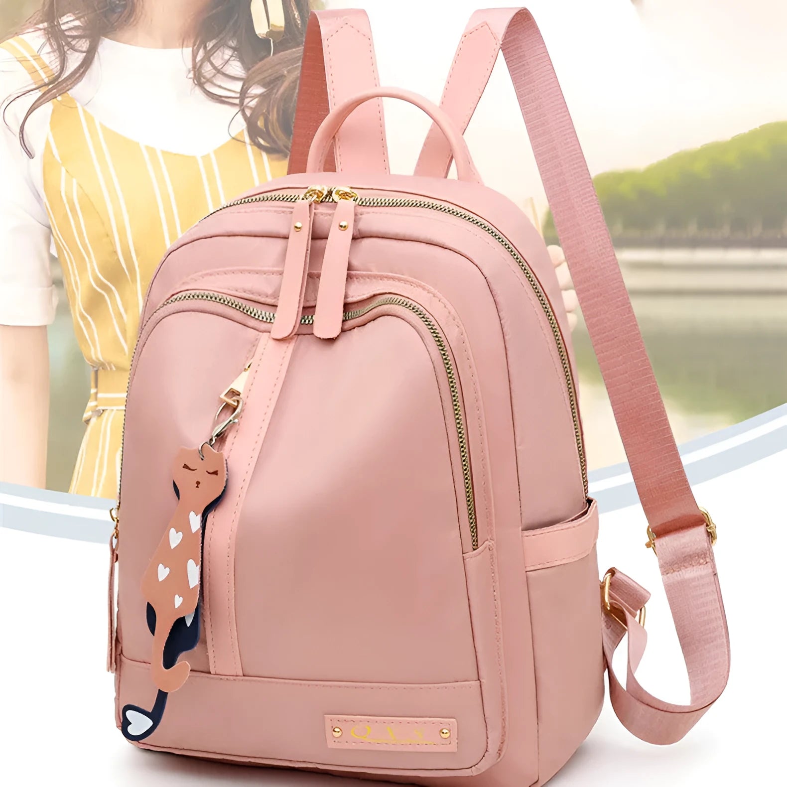 Black or pink women's casual nylon backpack with soft handle, showing internal zipper pockets and double shoulder straps.