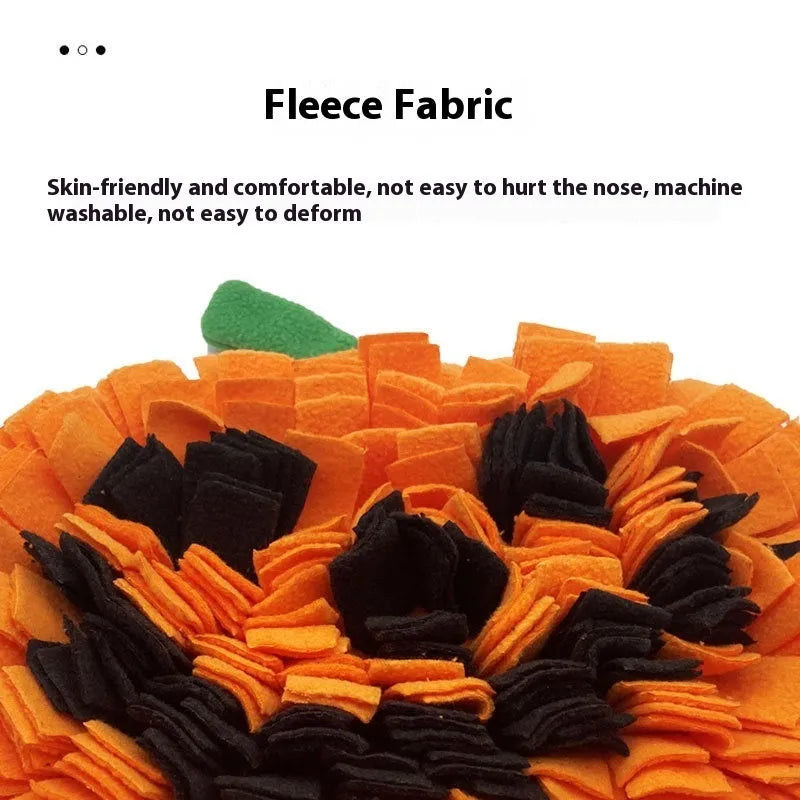 Orange pumpkin-shaped pet slow feeder snuffle mat with textured polar fleece channels