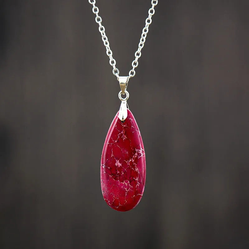 Jade pendant necklace with 18K gold plated chain showing water drop, heart, bow, and constellation designs