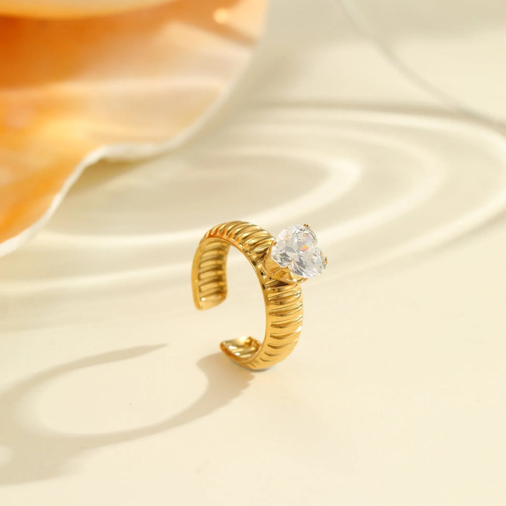 Geometric gold-electroplated stainless steel women's ring with zircon inlays and open mouth adjustable design