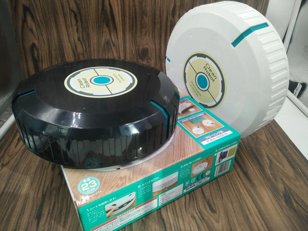 AC automatic robot vacuum cleaner in black or white on a hardwood floor
