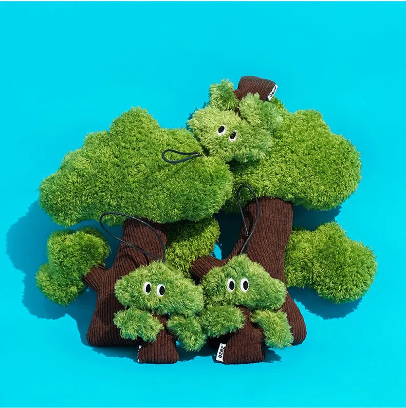 Green pine tree-shaped cat chew toy with a hanging loop, shown with size options.