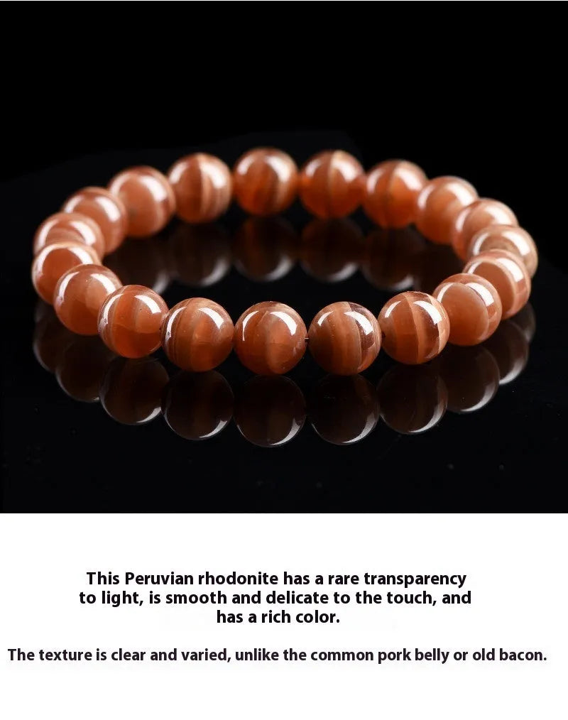 Natural Old Mine rhodochrosite mineral bracelet with round manganese spar beads in geometric design.