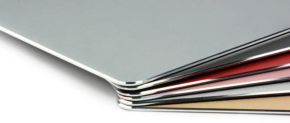 Aluminium alloy double-sided mouse pad in black with wrist support, 300x240mm size, flat on desk