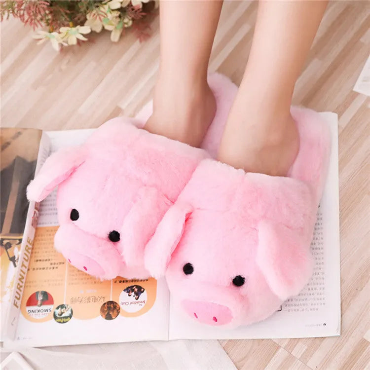 Pink pig floor slippers with short plush material showing size conversion chart for international measurements