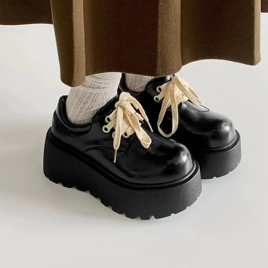 Matte black women's lace-up shoes with a chunky 6-8cm platform heel and round toe.