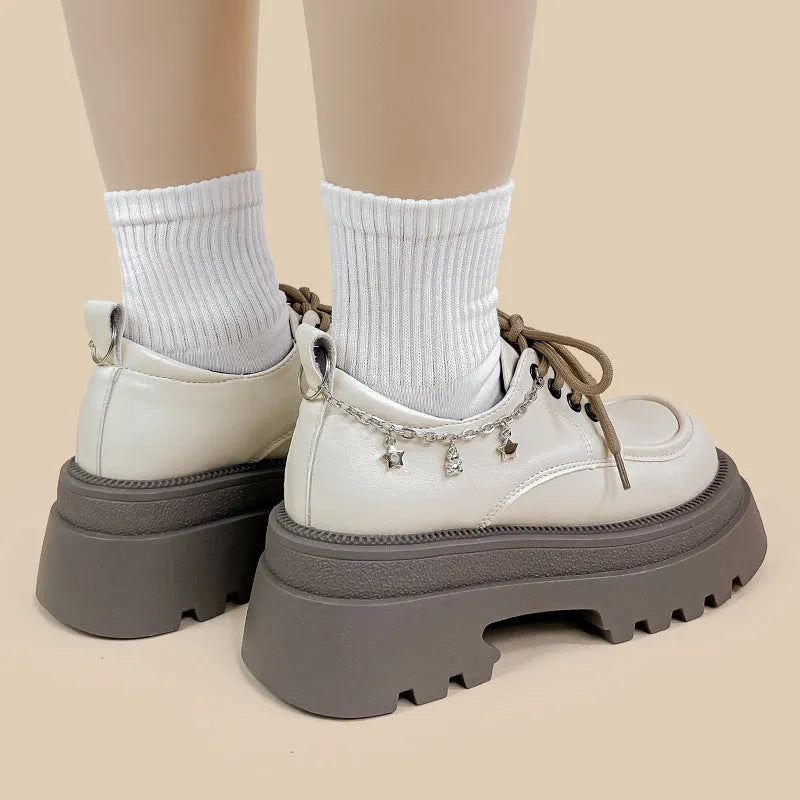 White PU leather Mary Jane platform shoes with thick chunky heel and front lace-up in XINGX bear colour.