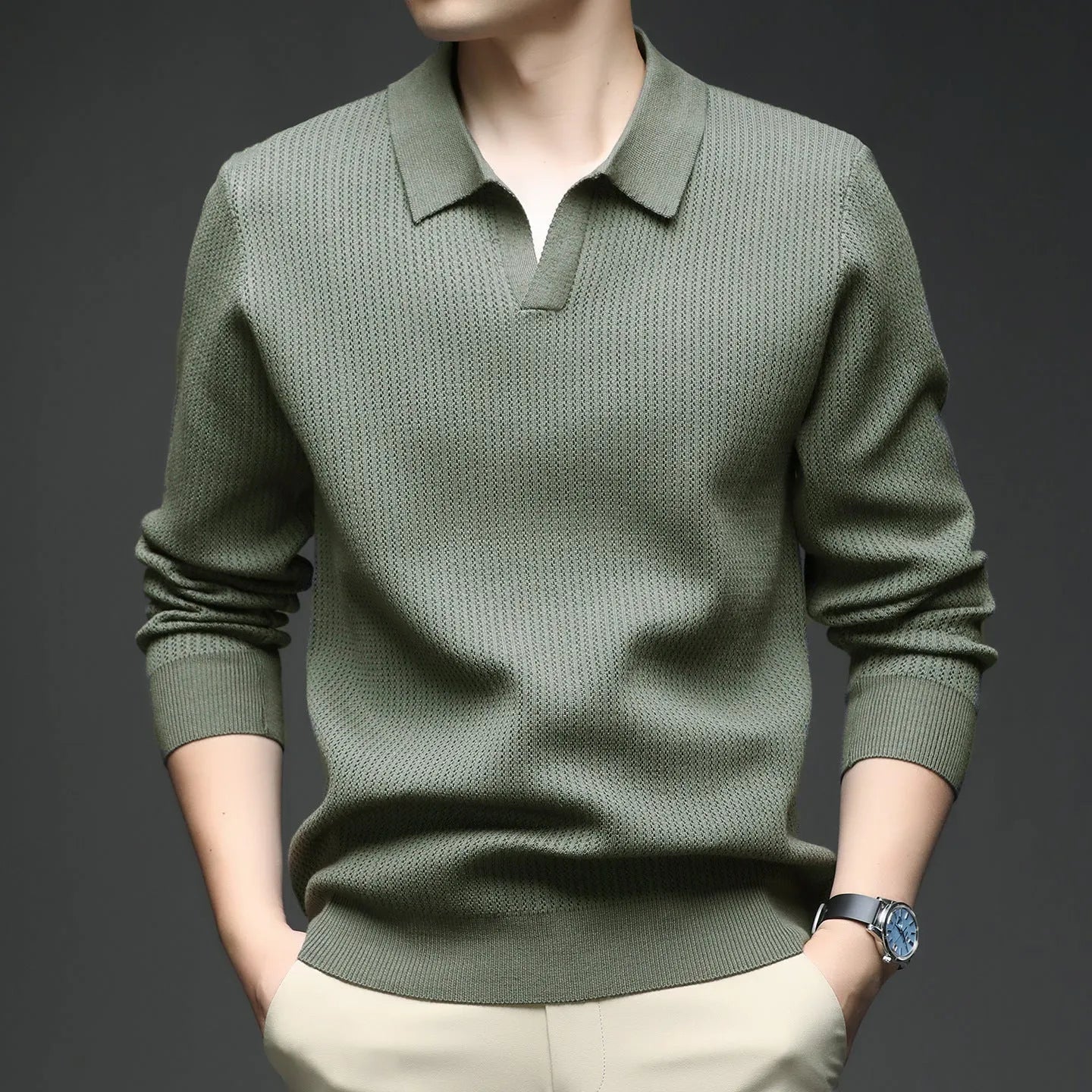 Men's loose-fit casual pullover sweater in a polyester, viscose and nylon blend, shown in green colour.