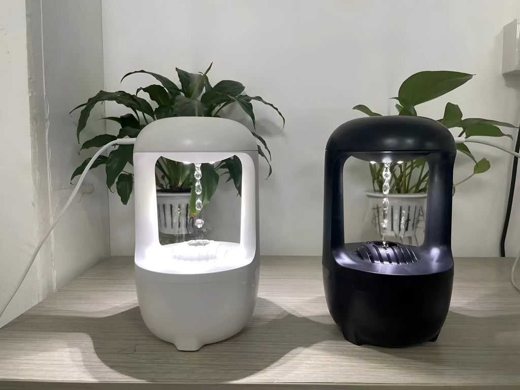 Black or white anti-gravity humidifier showing water droplet effect, with USB cable and 500ml water tank.