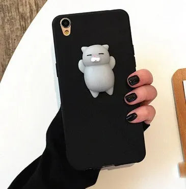 Soft silicone TPU iPhone case with 3D cartoon cat design for multiple iPhone models.