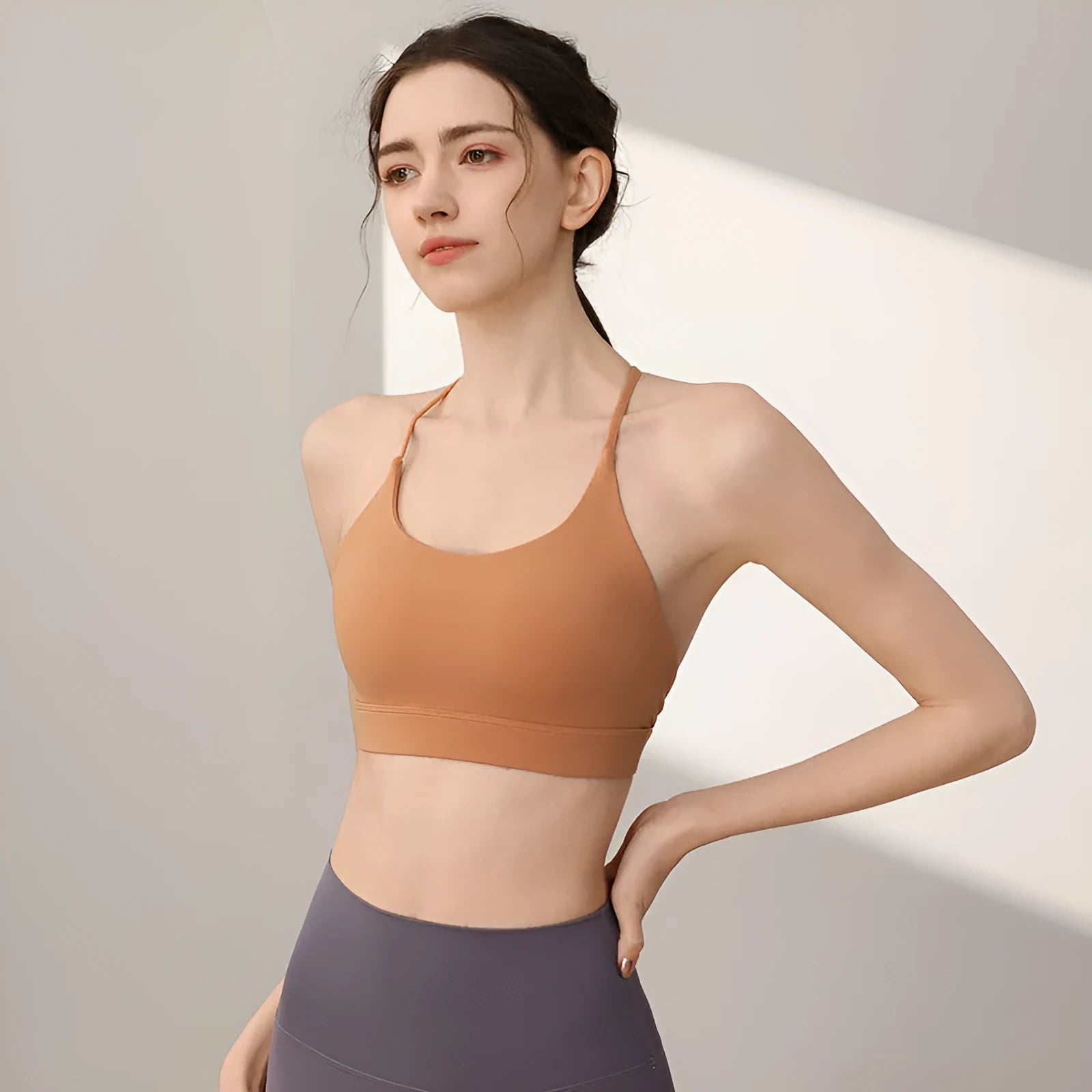 Women's nylon sports vest in various colours with fixed double-shoulder straps for running and yoga.