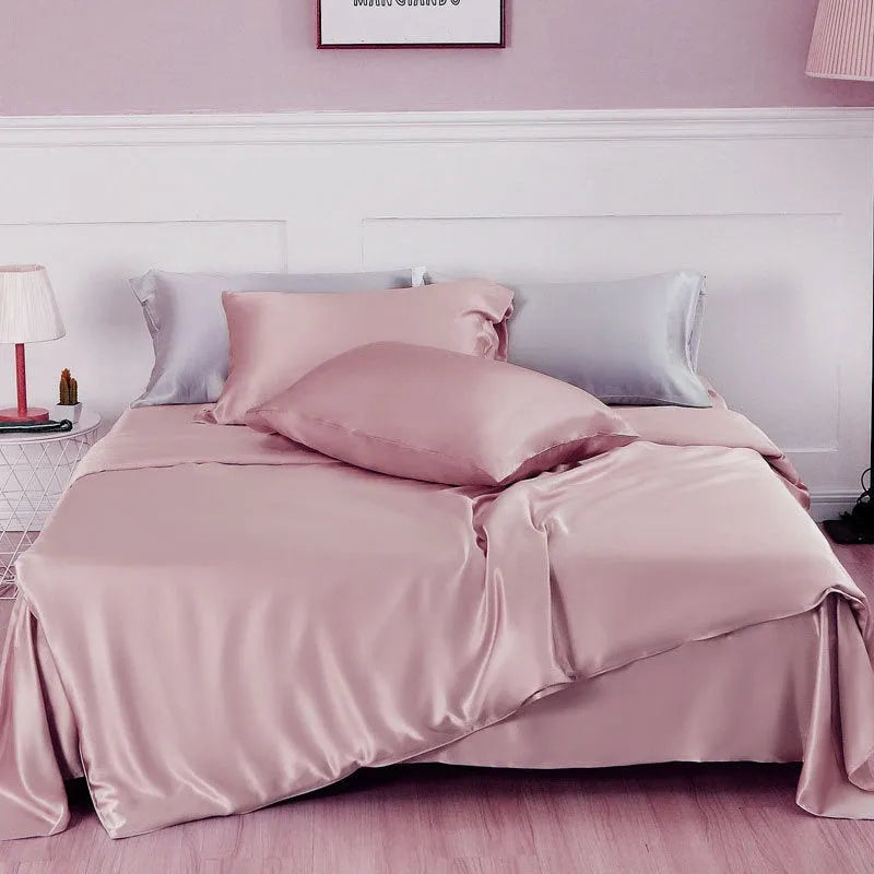 Solid colour double-sided silk duvet cover shown in bright brown, with other colour swatches for Lotus Pink, pea green, mysterious purple, white, and silver blue.