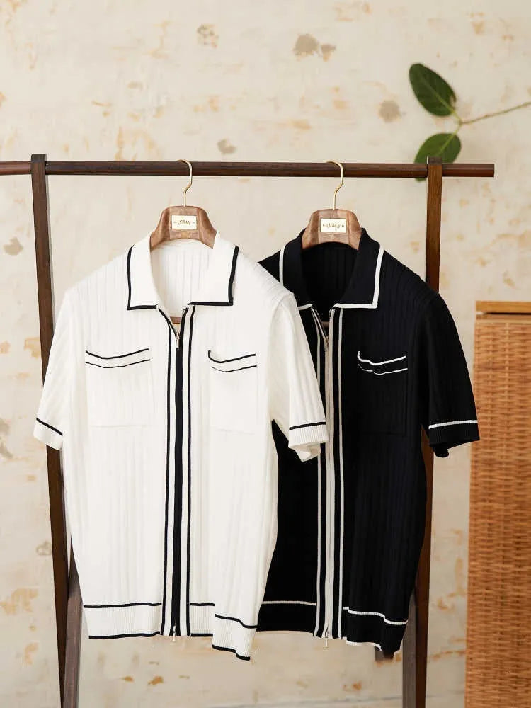 Slim fit lapel collar short-sleeved polo shirt in black, laid flat.