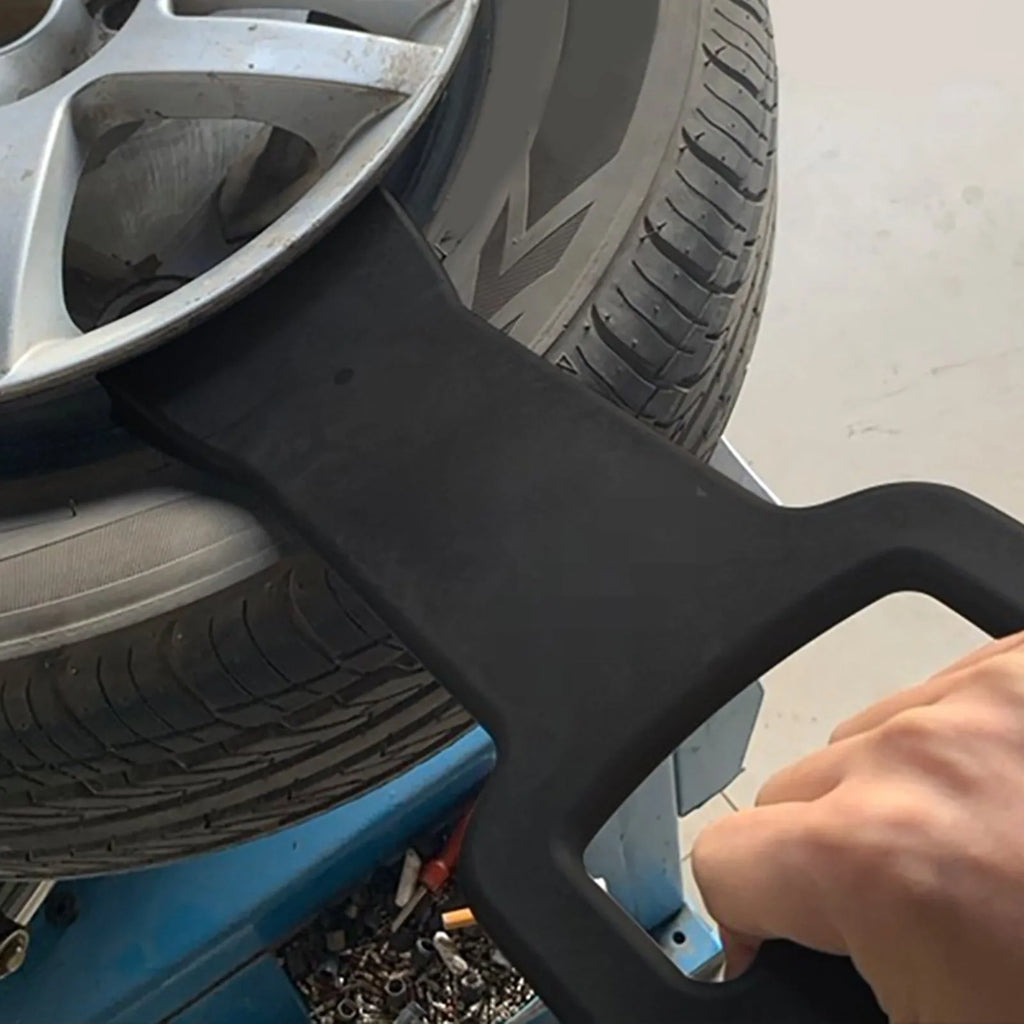 Black composite plastic tyre changer bracket for 17.5 to 24.5 inch car tyres, 30x15cm size