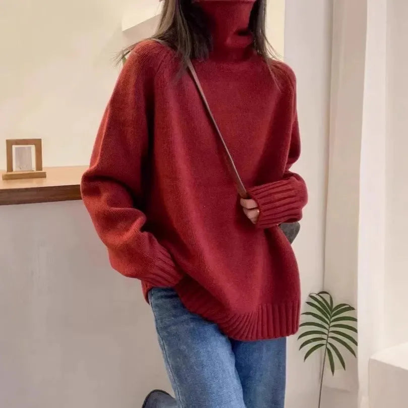 Women's loose turtleneck sweater in thick polyester mesh with curling pile collar, shown in solid colour.