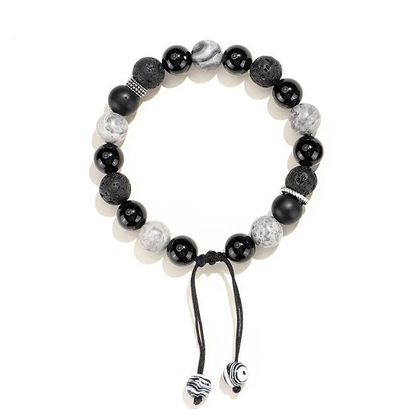 Black agate map stone volcanic rock bracelet with diamond-shaped stones and electroplated finish