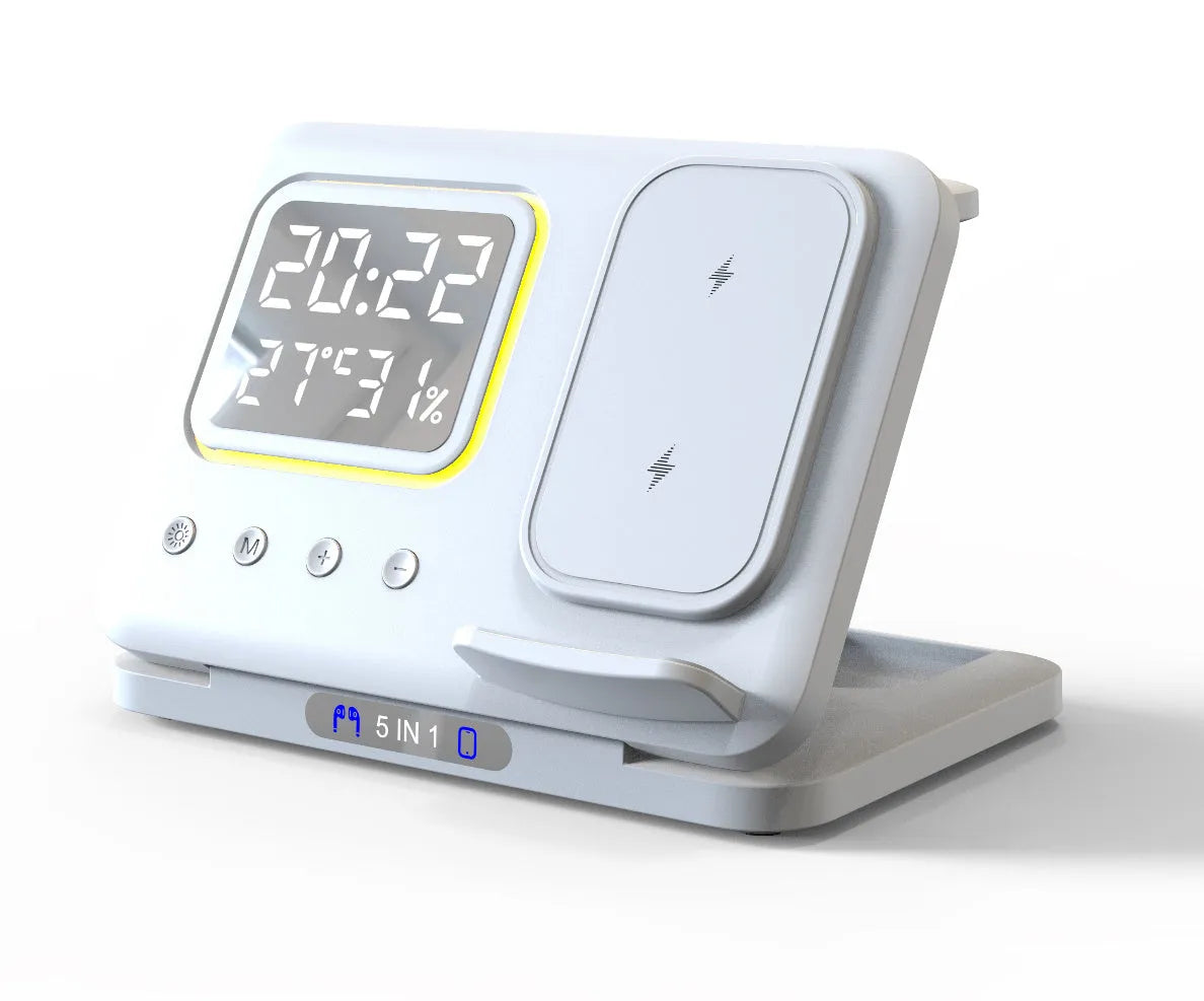 Black 15W wireless charging dock with phone, Apple Watch, and headphones on charging pads, showing LED digital clock display.