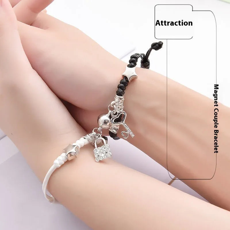 A pair of matching magnetic suction bracelets with an alloy electroplated finish, showing a sample design.