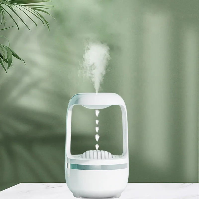 Black or white anti-gravity humidifier showing water droplet effect, with USB cable and 500ml water tank.