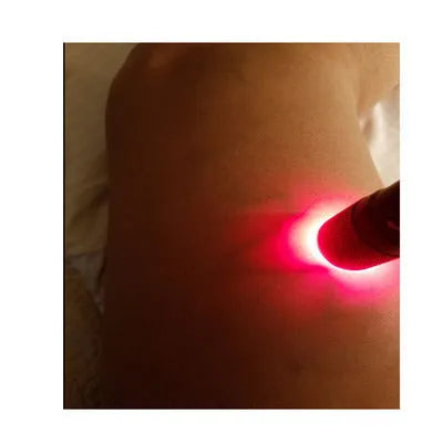 Black aluminium Smart Vein Locator device with red LED lights on, showing size against a hand.