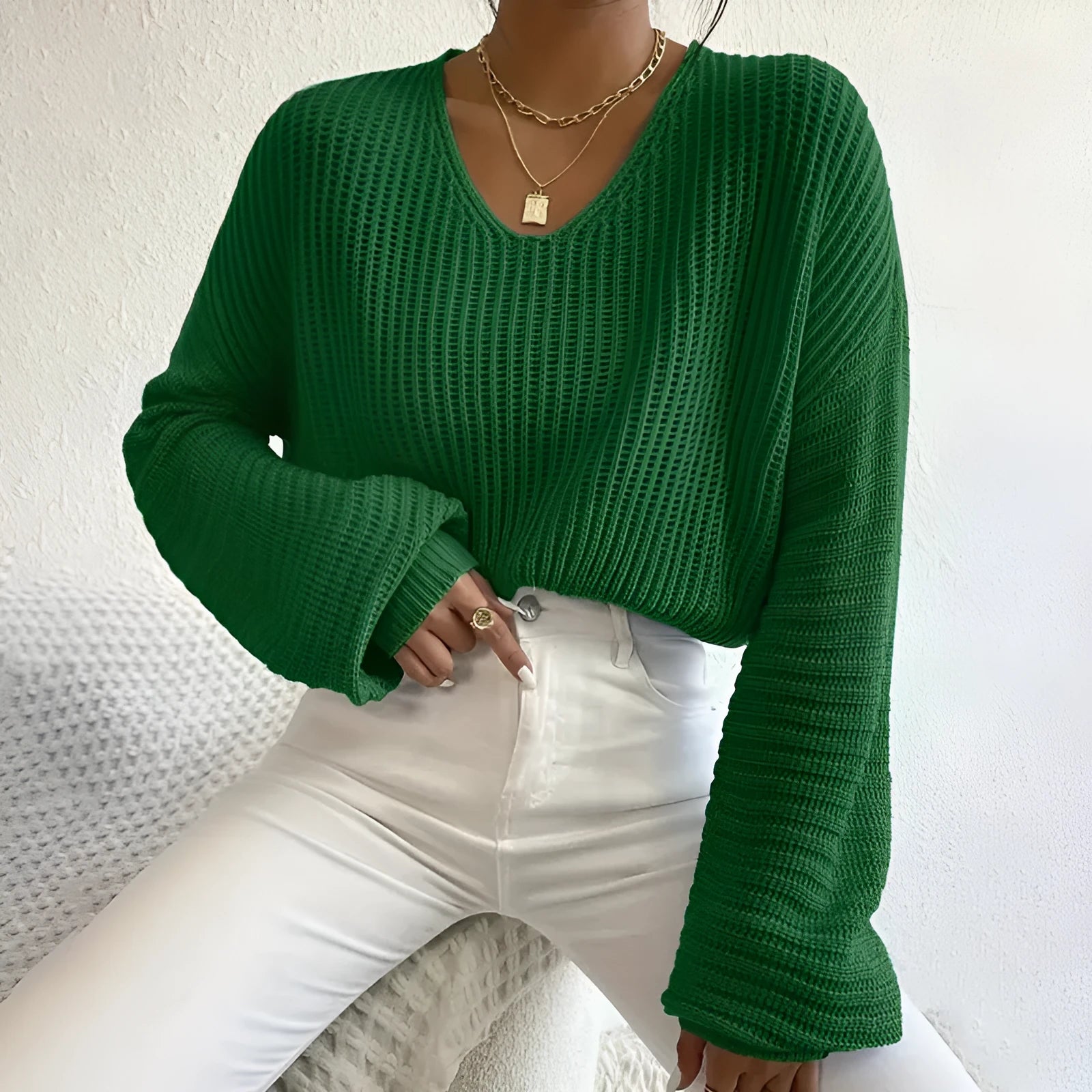 Women's solid colour long sleeve pullover top in a loose casual fit.