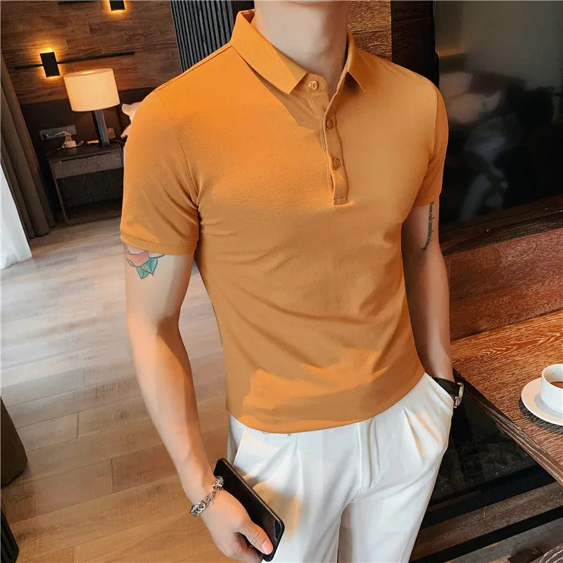 Man's solid colour cotton blend polo shirt with lapel collar and short sleeves in Korean style fit.