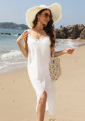White sleeveless crochet beach dress with hollow weaving and a side slit.