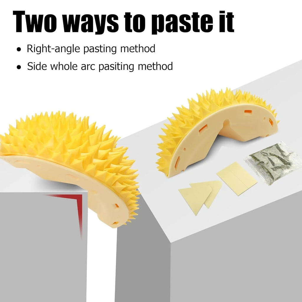 Yellow durian-shaped cat corner scratcher and massage comb mounted on a wall