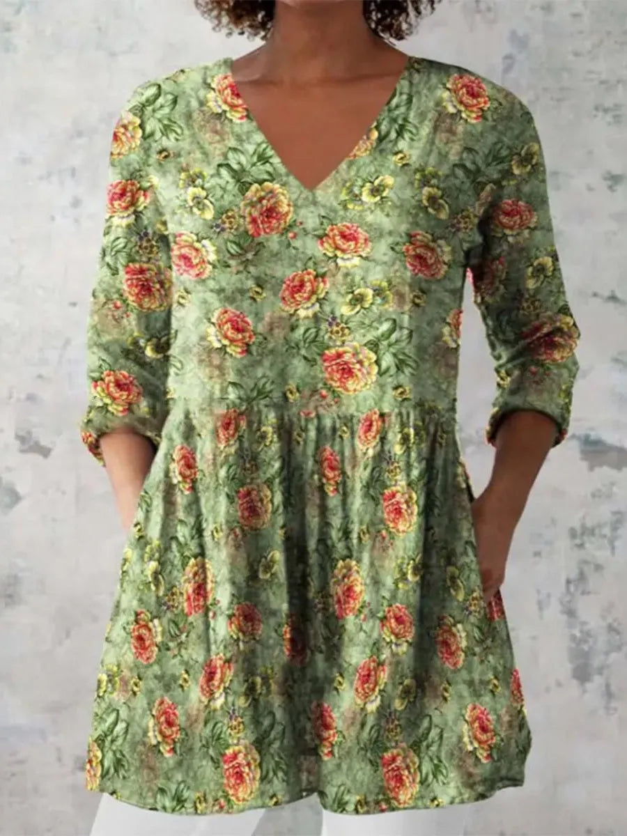 Women's loose fitted printed wave dress with 3/4 sleeves and wide waistband on hanger