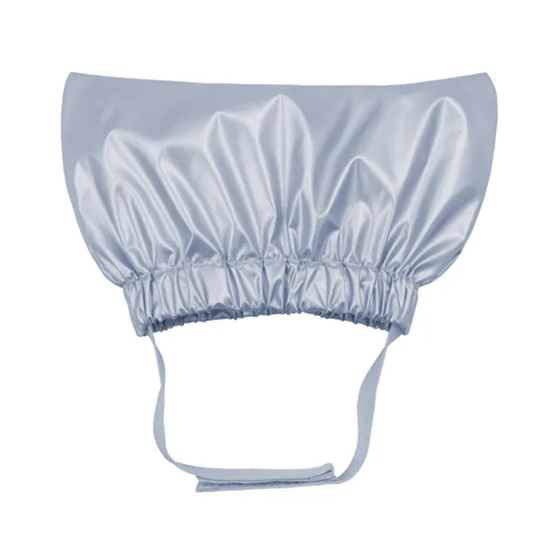 Adjustable pet shower cap in silver colour showing ear protection design and non-woven fabric construction