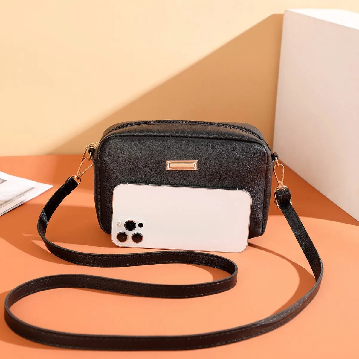 Women's solid colour PU shoulder bag with three-dimensional pocket in horizontal square shape
