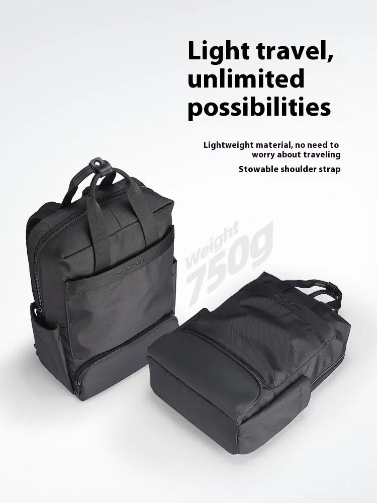 Black oxford cloth computer backpack with a 20-35 litre capacity and polyester lining.